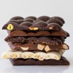 Chocolates Cut in Half Showing Inner Ingredients